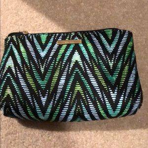 Make up/ cosmetics bag. Could also be pencil pouch